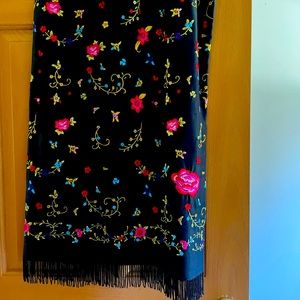 Full length embroidered black skirt with beefed hem